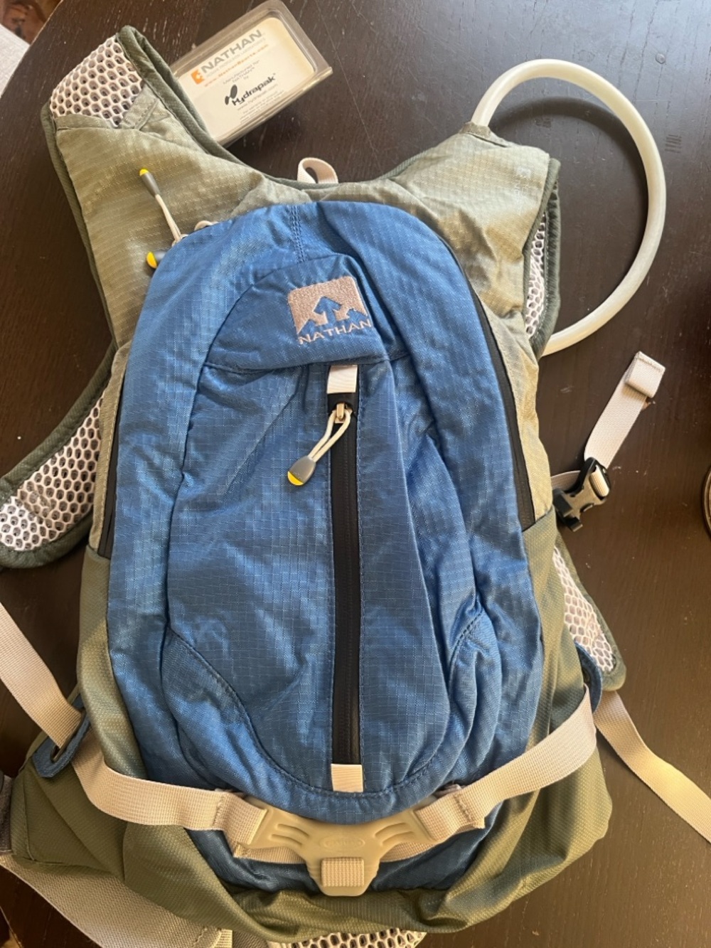 Nathan hydration backpack outdoor hiking Hydrapak reservoir water storage blue